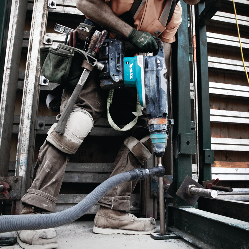 Makita GRH06PM Action Shot (drilling down) - Thumbnail